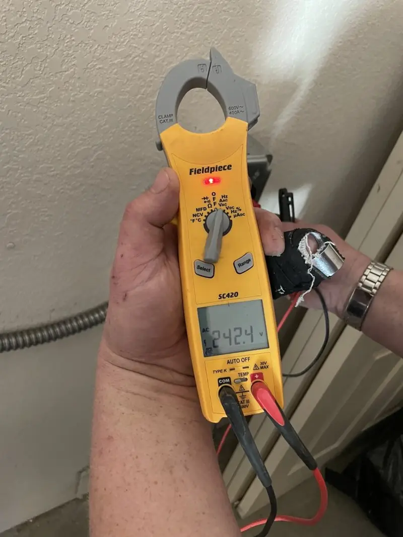 Voltage testing with clamp meter during Generator Installation in Buellton